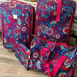 New direction 4 piece, paisley print luggage set.